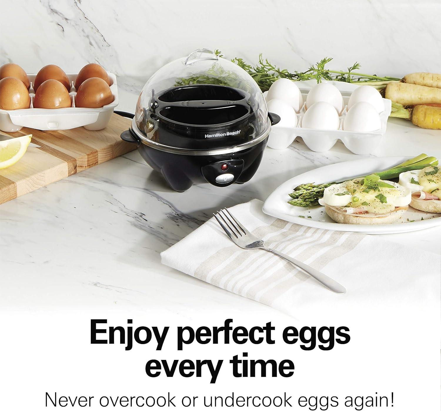 imageHamilton Beach 3in1 Electric Egg Cooker for Hard Boiled Eggs Poacher Eggs Omelet Maker amp Vegetable Steamer Holds 7 Mint 25504Holds 7 Black