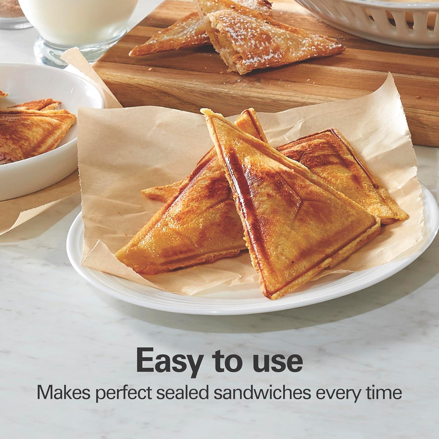 imageHamilton Beach Electric Sealed Sandwich Maker Grill with PFASFree Nonstick Plates Makes Stuffed French Toast Omelets Compact amp Easy to Store Black 25430GCompact Easy to Store Single Unit