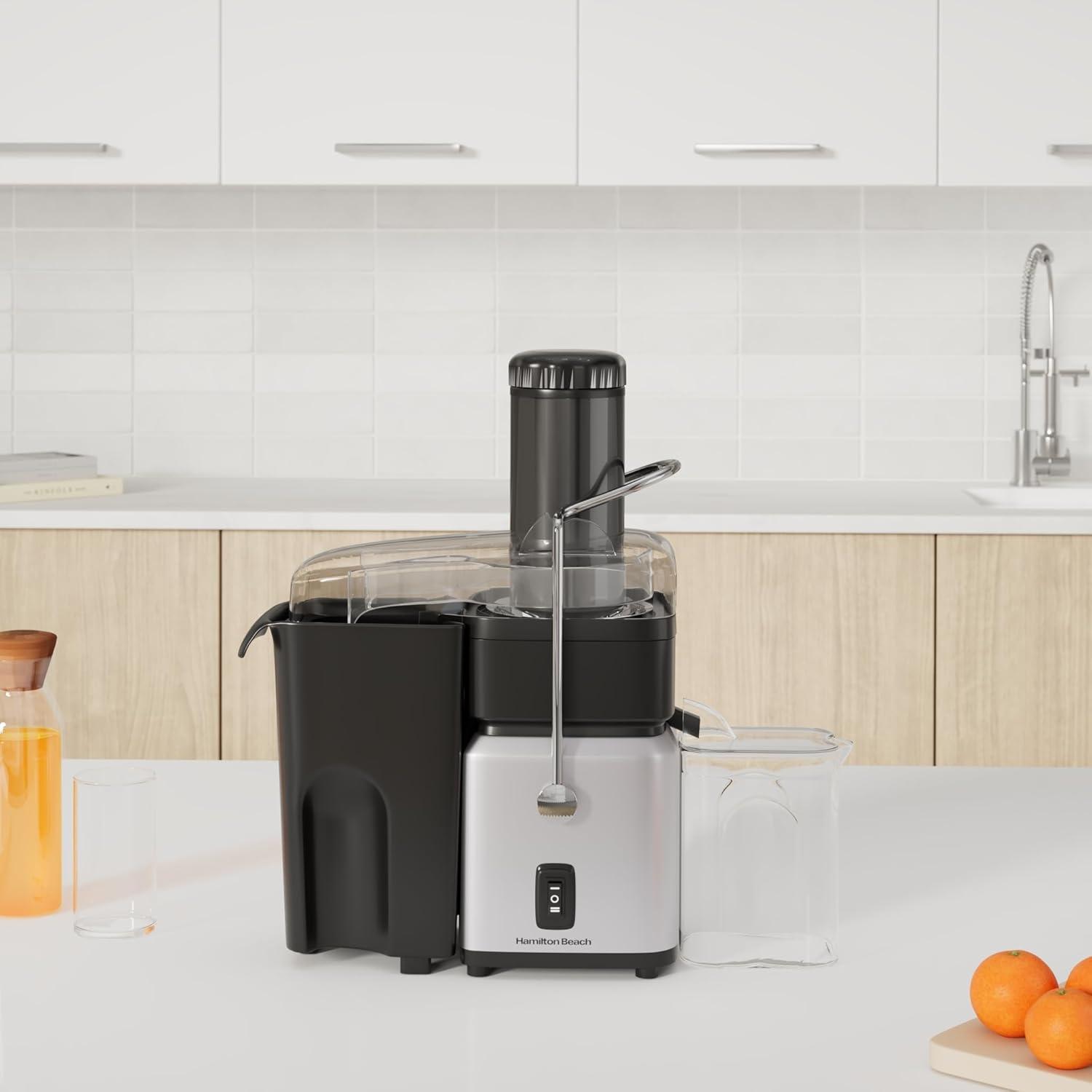 imageHamilton Beach Juicer Machine Centrifugal Extractor Big Mouth 3 Feed Chute Easy Clean 2Speeds 30 oz BPA Free Pitcher 700 Watt Motor Cleaning Brush Black 67840